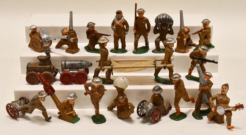 Lot of 20 Lead Barclay / Manoil Soldiers: Lot of 20 Barclay / Manoil soldiers. Includes a wounded soldier, soldier with cannon, soldier playing banjo, soldier with parachute, and more. Displays nicely with paint loss and wear from play and ag