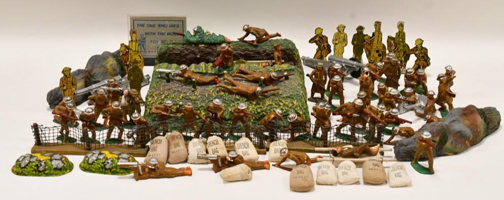Lot of Barclay, Manoil, Marx Lead and Tin Soldiers: Display of Barclay, Manoil, and Marx tin and lead soldiers. Lot includes a trench, trench bags, cannons, lots of lead soldiers, some tin soldiers, fences and more! Displays nicely with wear from play 