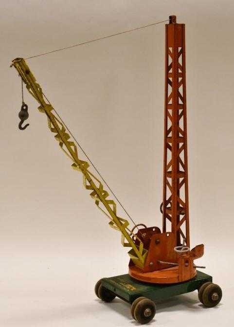 Buddy L Mobile Construction Derrick Crane: Buddy L mobile construction Derrick crane. Has paint loss and wear from play and age. Nice working condition. Measures approximately 24" tall.