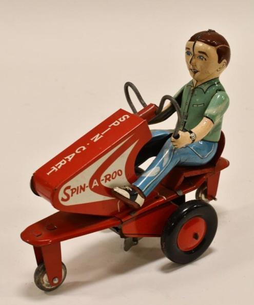 Alps Tin Litho Windup Spin-A-Roo Spin Cart: Alps tin litho windup Spin-A-Roo spin cart with driver. Displays nicely with wear from play and age. The windup mechanism works. Measures approximately 6 1/4" long.