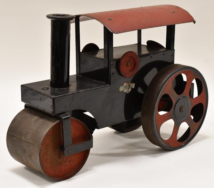 Original Steelcraft Ride On Steam Roller: Original Steelcraft ride on steam roller. The smoke stake is what turns the front roller. Displays nicely with paint loss and wear from play and age. Measures approximately 16 1/2" long.