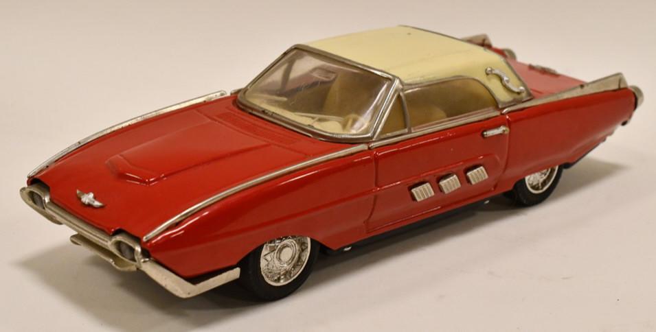 Tin Friction 1960's Ford Thunderbird MF-333: Tin friction 1960's Ford Thunderbird with MF-333 liscence plate. Displays nicely with light wear from play and age. Friction works. Measures approximately 10 3/4" long.