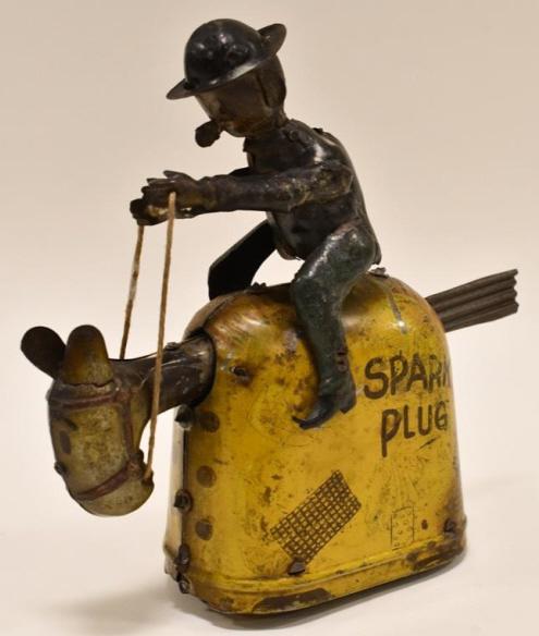 German Nifty Tin Windup Barney Google & Spark Plug: German Nifty tin windup Barney Google and Spark Plug. Displays nicely with paint loss and wear from play and age. The windup mechanism works. Measures approximately 7 1/2" tall.