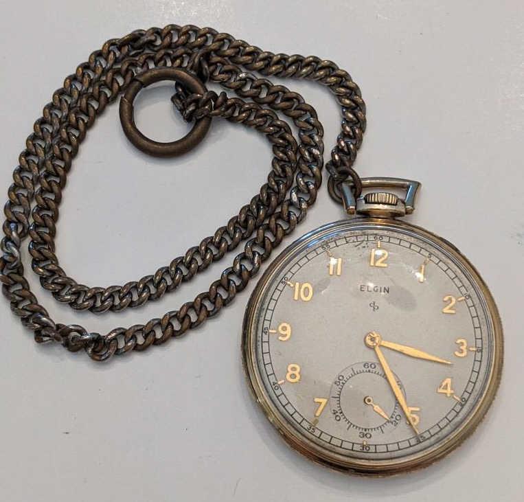 1948 Elgin 546 15 Jewel Open Face Pocket Watch: Nice running Elgin 15 Jewel Model 5 Grade 546 Open Face Pocket Watch. The 10 size pocket watch measures approx. 1-3/4" in diameter and has an Elgin 10k rolled gold plate case. The case shows some ligh