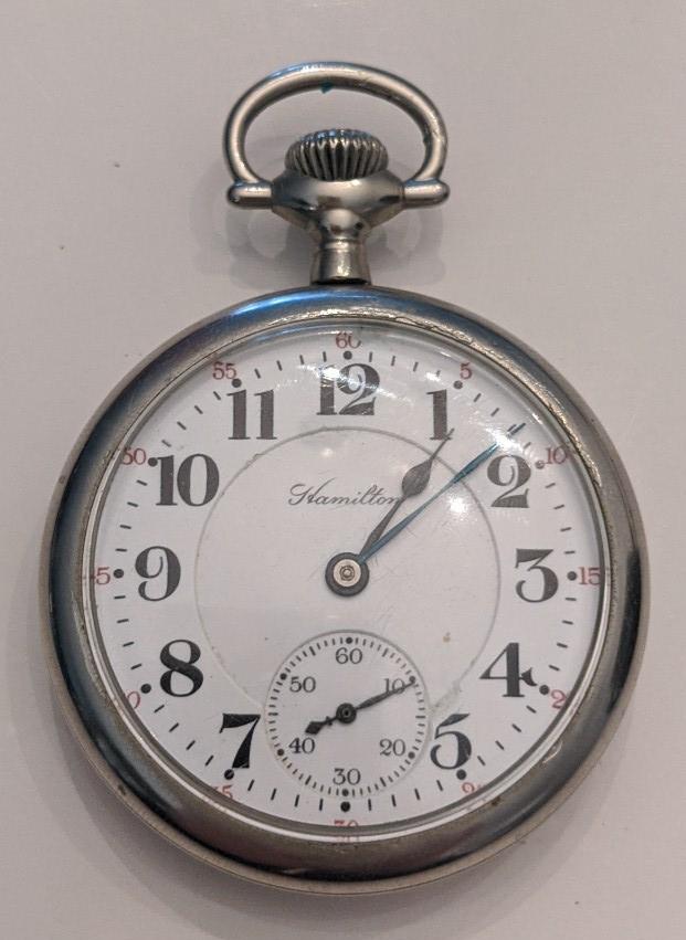 1927 Hamilton 992 21J Open Face Pocket Watch: Nice running Hamilton 21 Jewel Model 2 Grade 992 Open Face Pocket Watch. The 16 size railroad grade pocket watch measures approx. 2" in diameter and has a Philadelphia Silverode case. The case shows s