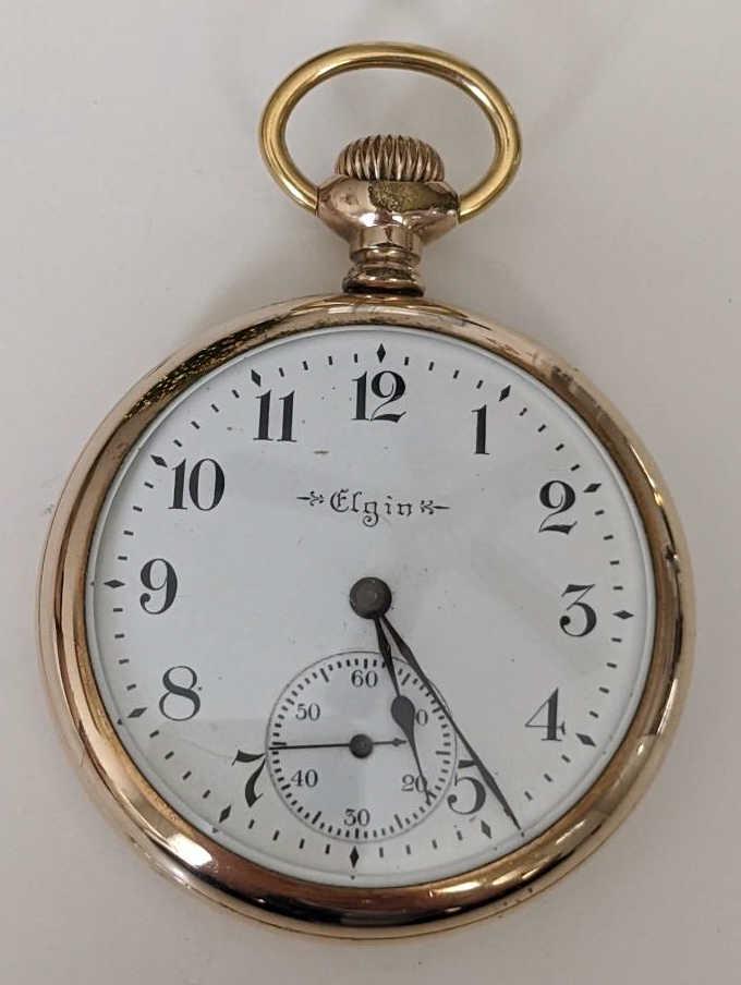 1901 Elgin 248 15 Jewel Open Face Pocket Watch: Nice running Elgin 15 Jewel Model 7 Grade 248 Open Face Pocket Watch. The 16 size pocket watch measures approx. 2" in diameter and has a Wadsworth Pilot 20 year case. The case shows some light wear an