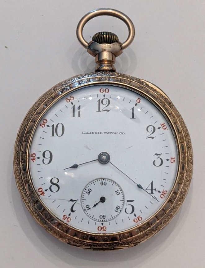 1907 Illinois 59 15 Jewel Open Face Pocket Watch: Nice running Illinois 15 Jewel Model 6 Grade 59 Open Face Pocket Watch. The 18 size pocket watch measures approx. 2-1/8" in diameter and has a Keystone J. Boss 20 year case. The case shows some wear. 