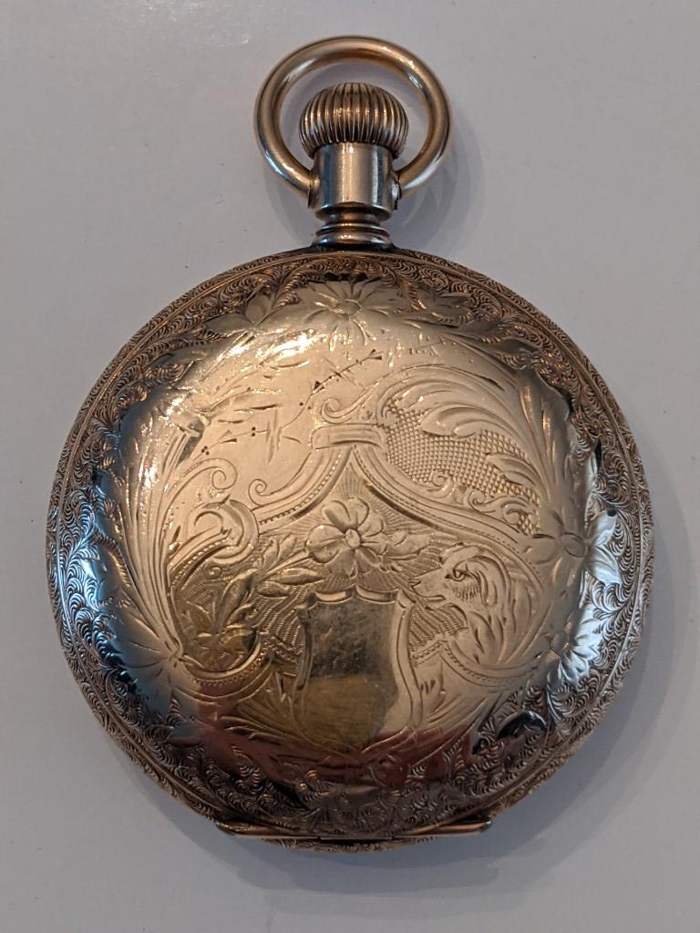 1897 Waltham No. 1 7J Hunting Case Pocket Watch: Nice running American Waltham 7 Jewel Model 1883 Grade No. 1 Hunting Case Pocket Watch. The 18 size pocket watch measures approx. 2-1/8" in diameter and has a Philadelphia Phoenix case. The case shows
