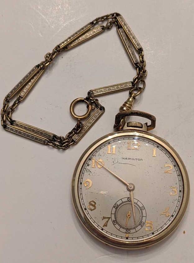 1940 Hamilton 921 21 Jewel Open Face Pocket Watch: Nice running Hamilton 21 Jewel Model 1 Grade 921 Open Face Pocket Watch. The 10 size pocket watch measures approx. 1-3/4" in diameter and has a Keystone J. Boss 14k gold filled case. The case shows so