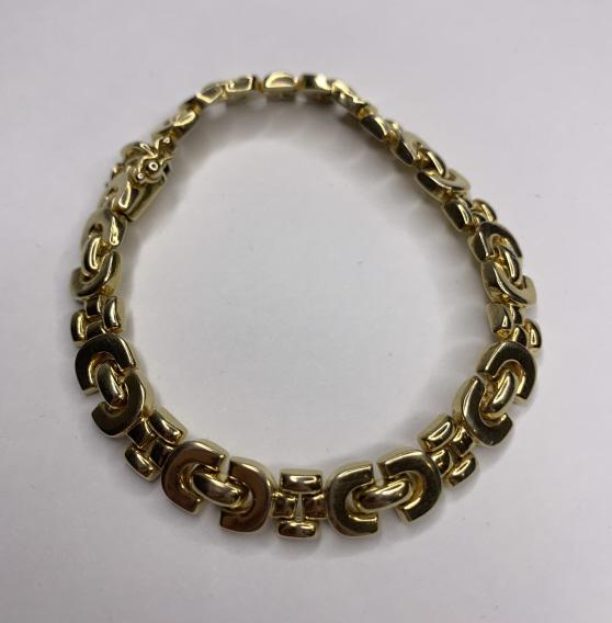14k Yellow Gold Link Style Tennis Bracelet: 14k Yellow Gold Link Style Tennis Bracelet. 7.5" long. Weighs: 16.98 grams