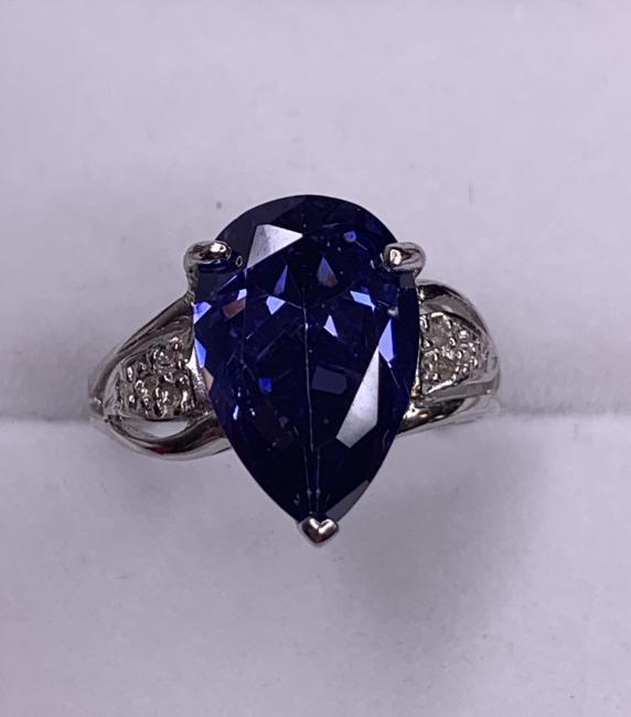 Sterling Silver 9.54ct Tanzanite and Diamond Ring: Lab created tanzanite. Size: 7.25