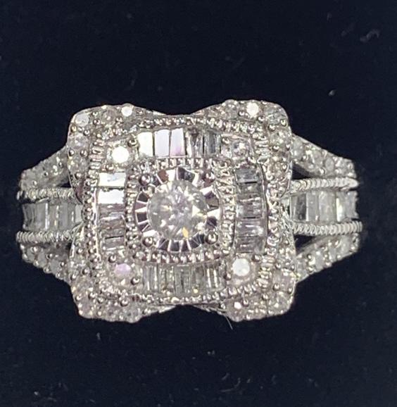 10k White Gold Tiffany Style Diamond Ring: Size: 5. Weighs: 4.18 grams
