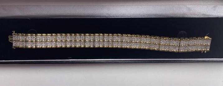 Gold Tone Diamond Tennis Bracelet: 7" in length