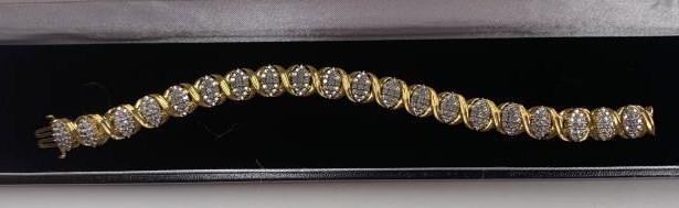 Diamond Cluster Tennis Bracelet: 7" in length.