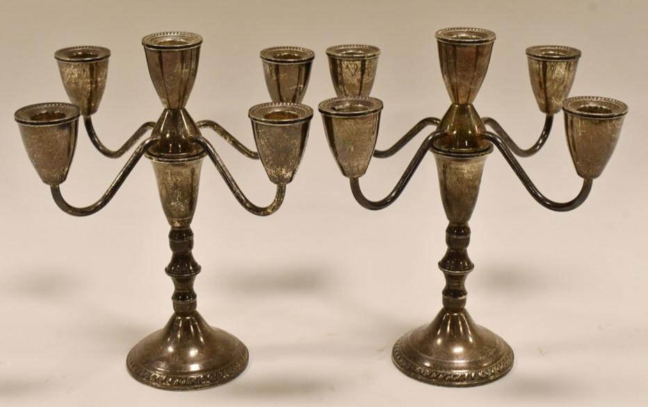 (2) Weighted Sterling Silver 5-Light Candelabras: Nice condition pair of weighted sterling silver 5-light candelabras. The candelabras measure 9-1/2" tall. Total weight 48.3 troy ounces.