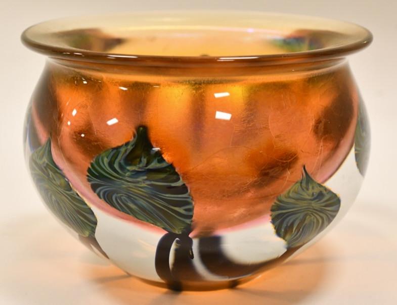 2001 David Lotton Gold & Leaves Art Glass Vase: Beautiful dated and signed 2001 David Lotton gold stretch with green blue leaves & vines art glass vase. The vase measures 3-7/8" tall x 5-1/2" in diameter and is in great condition.
