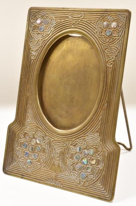 Rare Tiffany Studios "Abalone" Picture Frame #1171: Beautiful marked Tiffany Studios New York 1171 art nouveau picture frame in the "Abalone" pattern. The bronze frame has an oval opening and is in great condition with wonderful patina. Measures 10-1/4