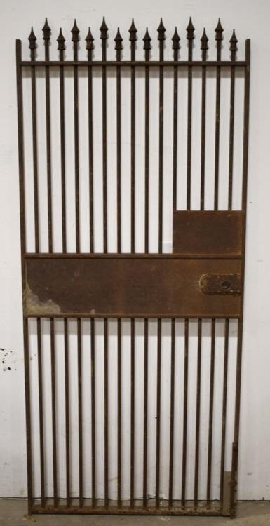 Antique Cast Iron Locking Garden Gate: Large heavy antique cast iron locking garden gate. Gate is in good condition for age with surface rust, wear, and missing lock mechanism. Displys very well. Measures approximately 70" tall by 31" acro