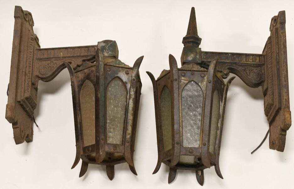 Antique Architectural Cast Metal Exterior Lights: Outstanding pair of matching large gothic antique cast metal exterior light fixtures. The fixtures were most likely salvaged from a demolished bank, hotel, or retail building. They are in nice conditi