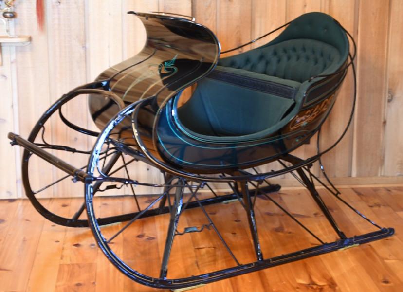 Restored Antique Albany Cutter: Sleigh Beautifully restored Antique Albany Cutter horse drawn sleigh. Very nice condition with light wear from display. Displays extremely well with pin striping . Measuresapproximately 64" across by