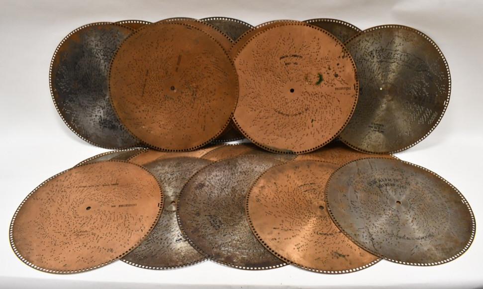(24) Antique Music Box 20-3/4" Discs: Lot of 24 antique music box 20-3/4" discs. Brands include Regina and more. They vary in condition .