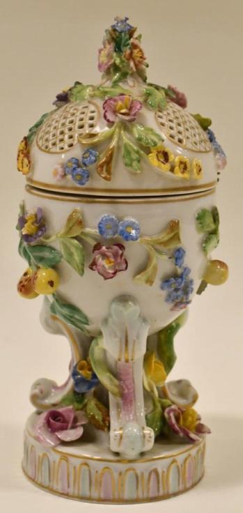 Antique Dresden Hinged Egg Trinket Box: Beautiful antique Dresden hinged egg footed trinket box. It has a fruit and flower design with gold accents. The condition is very good with some flea bites on some of the high edges. Measures 7-1/4" 