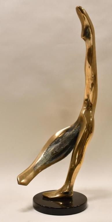 Bob Bennett Abstract Dancer Bronze Sculpture: Very nice signed and numbered bronze sculpture by artist Bob Bennett. The bronze features an abstract female dancer. Signed on the bottom foot and numbered 29 of only 150 made. Measures 31" tall x 14"