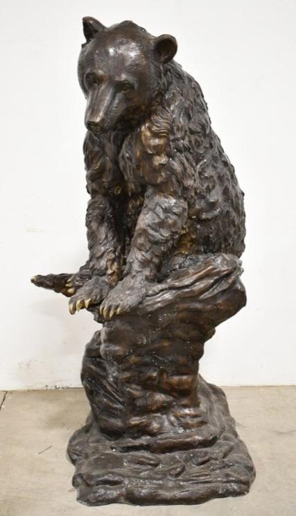 55" Tall Bronze Life-Size Bear Cub On Rock Statue: Beautiful 55" bronze life-size bear cub on rock statue. The statue has great detail and has some antique gold accents. Looks great and has some light use wear.