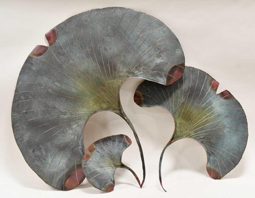 Set Of 3 T. Yano Copper Ginko Leaf Wall Set: Wonderful handmade copper three piece Ginko Leaf wall set signed by T. Yano. The pure copper leaves include multi-directional hangers on the back and the paint is safe for indoors or outdoors. The lea