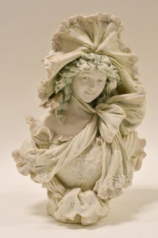 Antique Royal Dux Porcelain Woman Bust #567: Beautiful Antique art nouveau Royal Dux Bohemia porcelain bust featuring a young woman. The waist-up bust stands 13.5" tall and is in wonderful condition, has a couple small flea bites on the edges. B