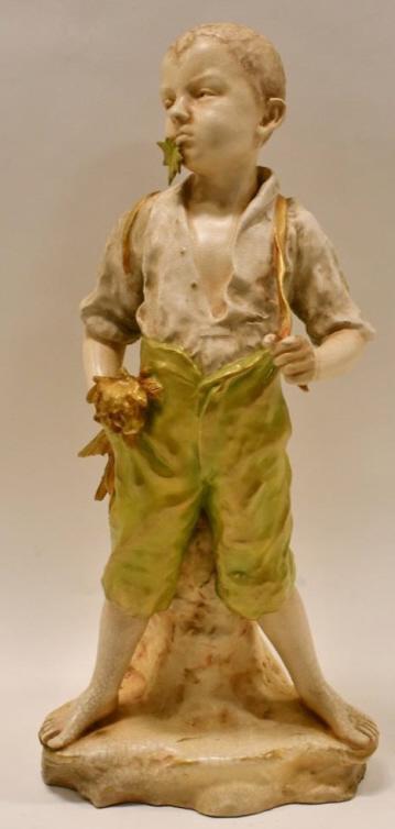 Teplitz Turn Amphora Austria RStK Figural Vase: Beautiful late 19th century Teplitz Turn Amphora Austria RStK porcelain figural vase featuring a boy pulling his suspenders. The figural vase stands 19" tall and is in nice condition, has all over cra