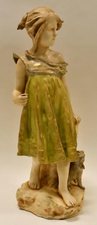 Teplitz Turn Amphora Austria RStK Figural Vase: Beautiful late 19th century Teplitz Turn Amphora Austria RStK porcelain figural vase featuring a girl with her dog. The figural vase stands 19-1/2" tall and is in nice condition, has all over crazing.
