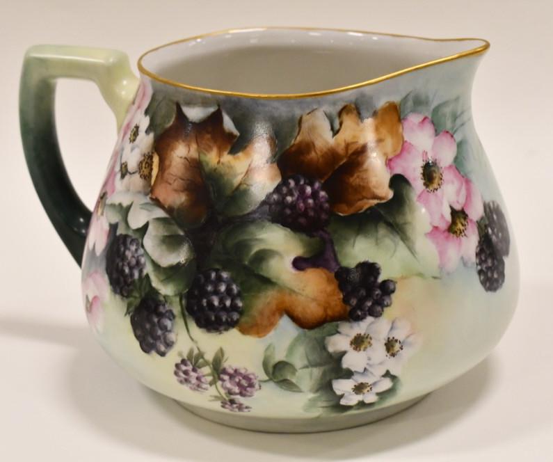 Antique W G & C Limoges Hand-Painted Pitcher: Beautiful antique hand-painted porcelain French W G & C Limoges pitcher featuring flowers, leaves, and berries. The pitcher measures 6" tall x 9" across and is in great condition. Has the W G & C Limo