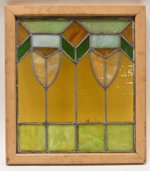 Geometric Stained Glass Panel: 20.5" x 18.25" stained glass panel. The panels has a nice geometric pattern. Nice complete condition with no cracks.