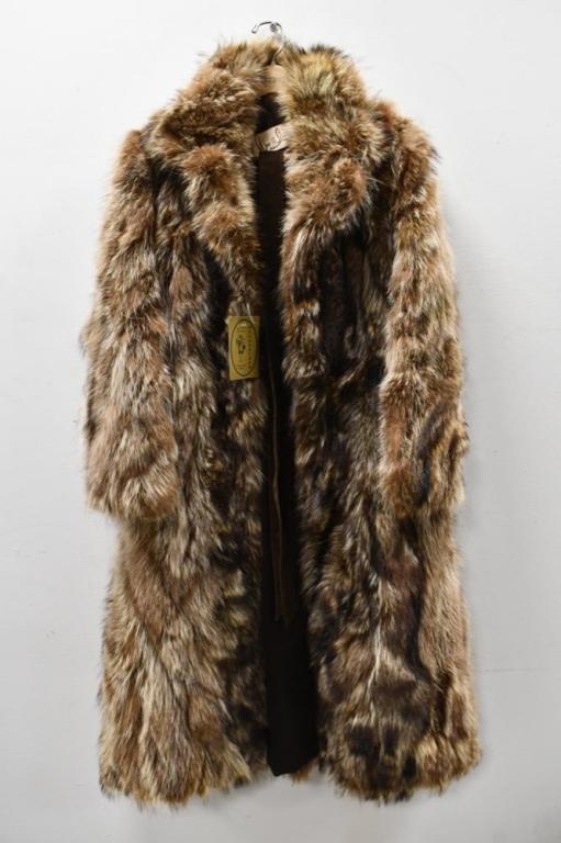 Ladies Full Length Silver Racoon Coat: Ladies full length silver racoon coat with brown suede belt. Ladies size small.