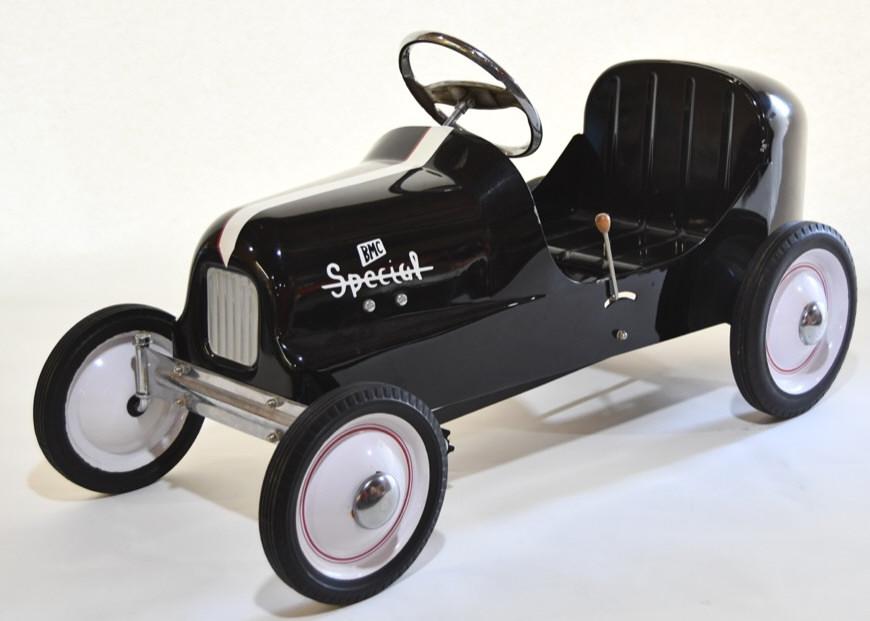 BMC Special #8 Hot Rod Pedal Car: Nice BMC Special #8 Hot Rod pedal car. Displays nicely with light wear from display. The tailpight is loose, but can be fixed. Measures approximately 41" long.