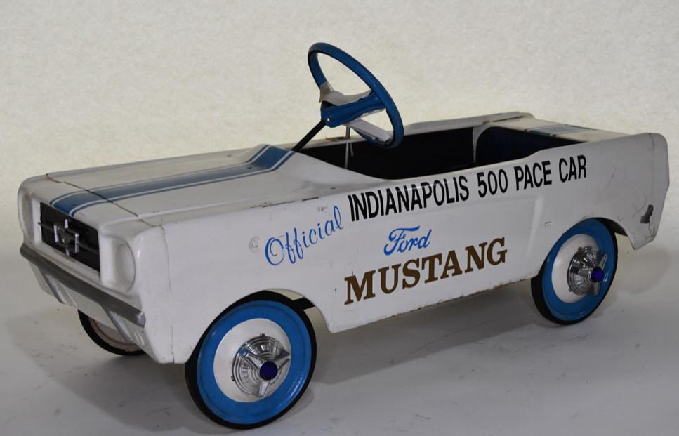 AMF Indianapolis Ford Mustang 500 Pedal Car: Nice AMF Official Indianapolis Ford Mustang 500 Pace Pedal Car. In overall great shape with some paint chipping. Displays nicely with wear from display and storage. Measures approximately 38" long.