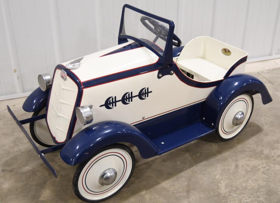 Restored American National Overland Pedal Car: Nicely restored American National Overland pedal car. Nice condition with some wear from age and display. Displays very well with nice paint job. Measures approximately 42" across.