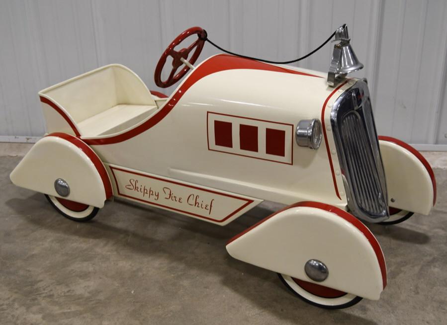 Restored 1930s Skippy Fire Chief Pedal Car: Restored 1930s Skippy Fire Chief pedal car. Nice older restoration with some wear from display and storage. Displays very well. Measures approximately 44" across.