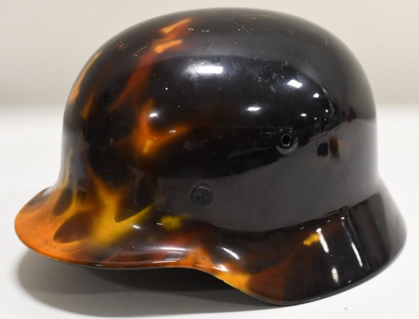 Biker Custom WWII German M42 Helmet: Original WWII German M42 military helmet with custom flame paint job. This german helmet was stripped of its original paint and repainted with realistic flames. Missing original liner. Consignor claim