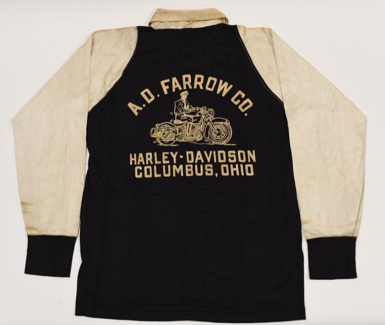 1950s A.D. Farrow Harley-Davidson Champion Jersey: Amazing original 1950s A.D. Farrow Harley-Davidson racing jersey by Champion Sportswear. Jersey is in very nice condition with discoloration and wear from use and age. Has tire marks on left sleeve. D