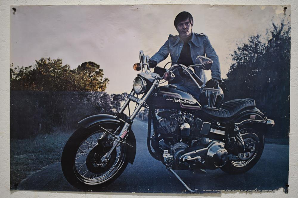 Vintage AMF Harley-Davidson Super Glide Adv Poster: Vintage AMF Harley-Davidson Super Glide advertising poster. Poster is in fair condition with discoloration and edge wear from use and age. Displays well. Measures approximately 36" across by 24" tall.