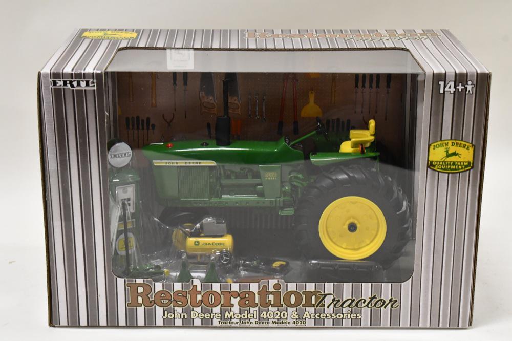 1/16 Ertl John Deere 4020 Restoration Set: 1/16 Ertl John Deere 4020 restoration tractor set with accessories. Nice condition in the box.