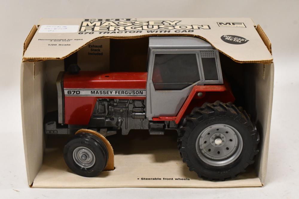 1/20 Ertl Massey Ferguson 670 Tractor With Cab: 1/20 scale Ertl Massey Ferguson 670 tractor with cab. Nice condition in the box.