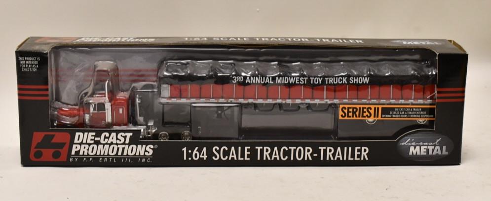 1/64 DCP Peterbilt 379 w Covered Wagon Load: 1/64 DCP Peterbilt 379 with covered wagon load flated trailer. Nice condition in the box. Item no. 30417.