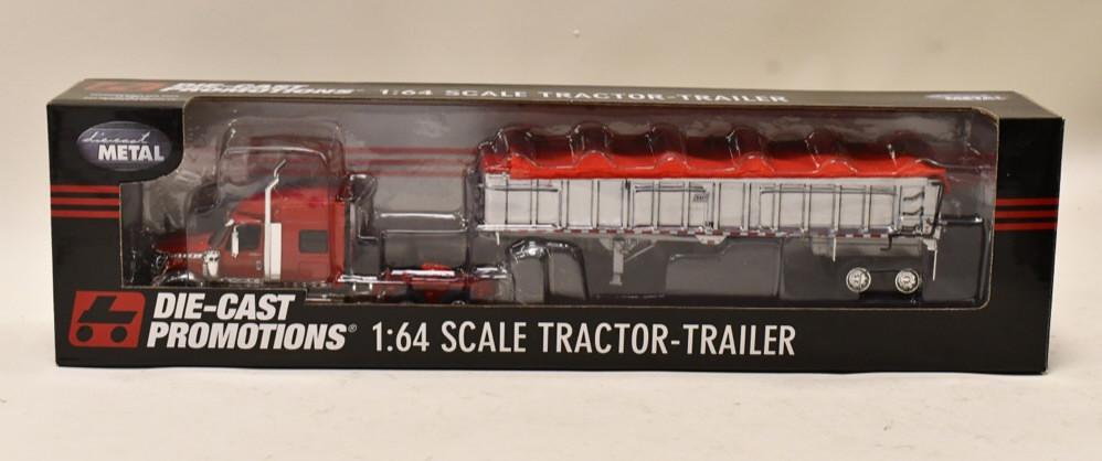 1/64 DCP International Lonestar w East End Dump: 1/64 DCP International Lonestar with East end dump trailer. Nice condition in the box. Item no. 32548.