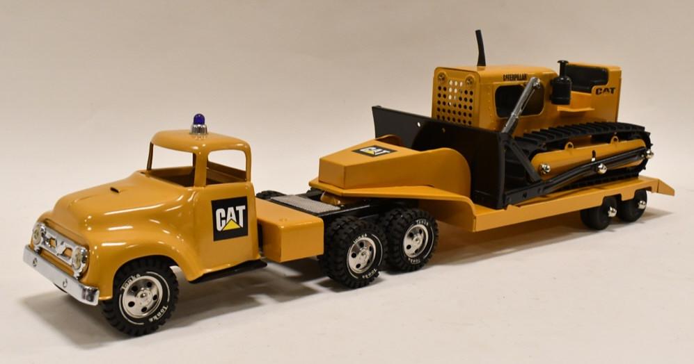 Custom Tonka Caterpillar Truck w/ Lowboy and Dozer: Beautiful custom Tonka Caterpillar truck with lowboy. Also comes with a custom Tonka Toys Caterpillar dozer. Displays nicely with a professional restoration. Overall measures approximatley 29 1/4" lon