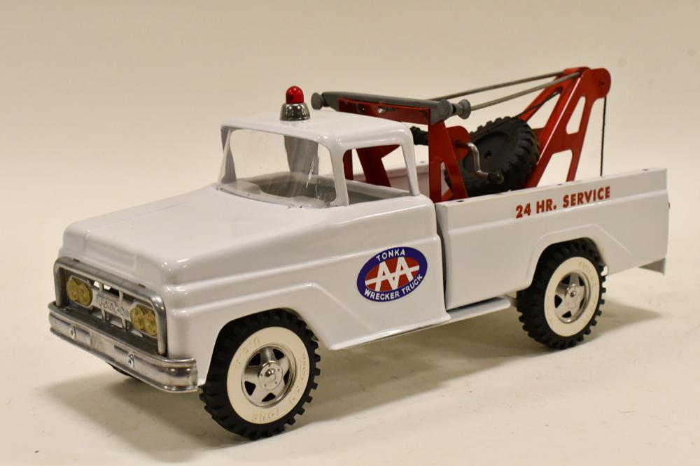 Restored Tonka AA Wrecker 24 HR. Service Tow Truck: Restored Tonka AA wrecker 24 hour service tow truck. Displays well with professional restoration. Nice condition with light wear from storage and display. Measures approximately 14" long