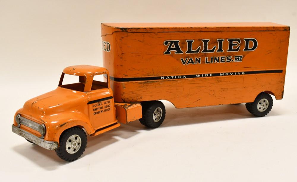 Tonka Allied Van Lines Semi Truck & Trailer: Original Tonka private label Allied Van Lines round fender truck and trailer. Displays well with paint loss and wear from play and age. Measures approximately 24" long.