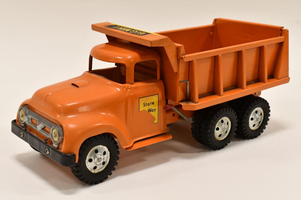 Tonka Big Mike Dual Hydraulic Dump Truck: Tonka State Hi-Way Dept. Big Mike dual hydraulic dump truck . Displays nicely with paint touch ups. Good condition with wear from storage and display. The dual hydraulics work. Measures approximately 